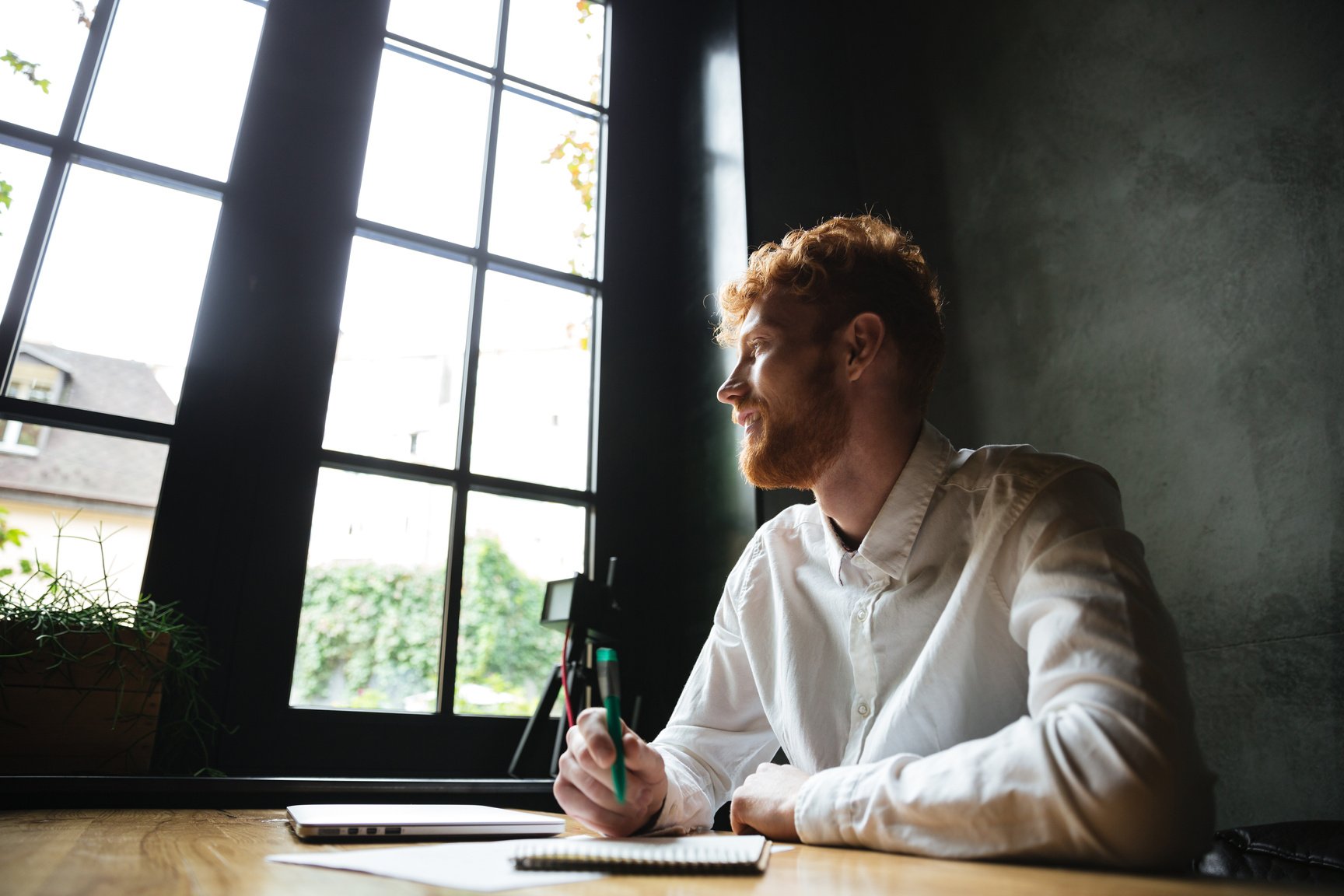 Man Writing Something